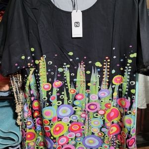 Cute blouse with colorful floral designs size 1X